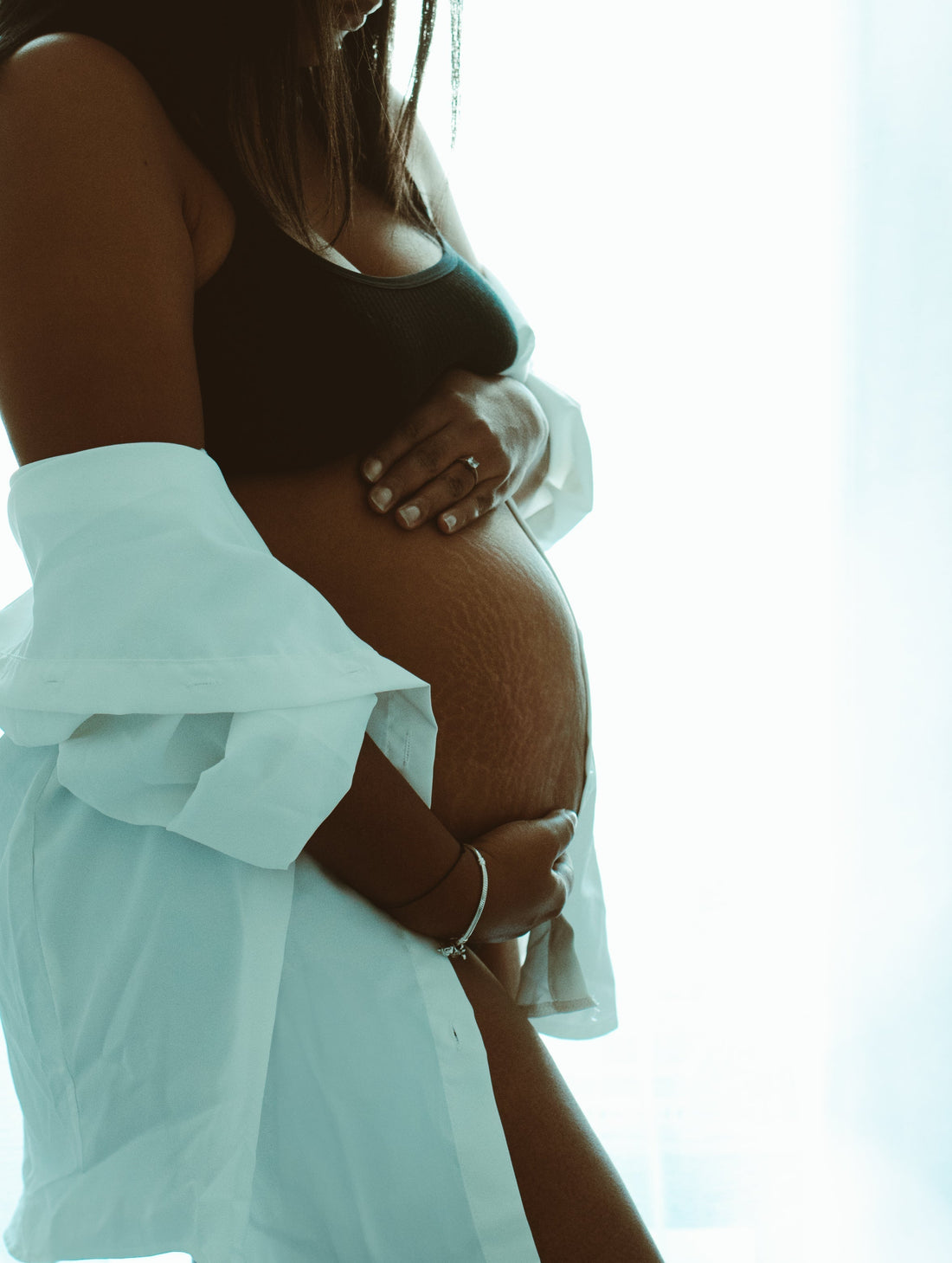 Organiser sa séance photo de grossesse maison : le guide pas à pas